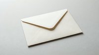 Elegant cream envelope with triangular flap on neutral background for correspondence, invitations, and professional mailing needs.
