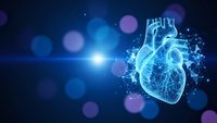 Digital human heart with glowing blue wireframe structure and light particles on dark background for medical technology and healthcare concepts.