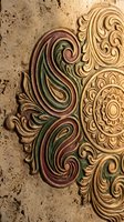Ornate carved wooden decorative element with intricate swirling patterns and floral motifs in gold, green and burgundy colors on textured background.