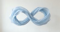 Blue infinity symbol made of flowing translucent ribbons on white background representing endless possibilities and eternal concepts for business logos.