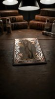 The Hermit tarot card on wooden table with vintage books and pendant lights creating mystical fortune telling atmosphere for spiritual guidance sessions.
