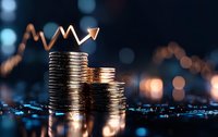 Stacks of silver coins with glowing upward arrow trend line against dark blue background with bokeh lights, representing financial growth and investment success.