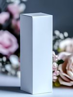 White rectangular box mockup against blurred floral background with pink roses and soft bokeh effect, suitable for product packaging design and branding presentations.
