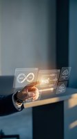 Businessman hand touching holographic interface with build, run, and cloud storage icons for software development and digital transformation projects.