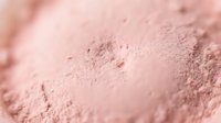 Finely textured rose powder with soft focus depth, suitable for cosmetics, beauty products, makeup tutorials, and skincare marketing materials.