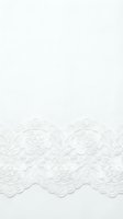 White delicate lace trim border with intricate floral patterns isolated on white background for wedding invitations and craft projects.