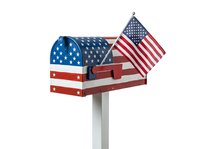 Patriotic mailbox with American flag design and stars stripes pattern, isolated on white background, ready for design projects and commercial use.