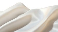Close-up of soft, flowing cream and white fabric with gentle waves and folds, showcasing smooth texture and light play for textile, fashion, and design projects.