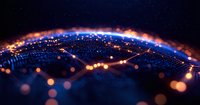 Futuristic digital landscape with glowing orange and blue particles forming wave pattern against dark background, abstract technology network visualization.