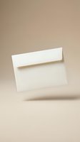 White blank envelope floating on beige background with soft shadow for correspondence and mailing design projects.