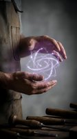 Male hands holding glowing purple atomic structure symbol, representing science, innovation, and technology. Suitable for educational materials, scientific research, tech startups, and innovation concepts.