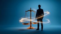 Professional businessman silhouette with golden scales of justice and glowing light trails on blue background for legal services and law firm branding.