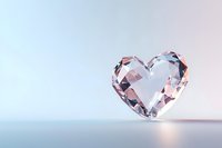 Crystal heart shape on soft pastel background with reflection, romantic symbol of pure love and luxury jewelry design element for wedding decor and valentines.
