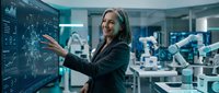 Middle-aged woman with gray hair, Caucasian ethnicity, wearing business attire, interacting with digital interface in high-tech laboratory environment with robotic arms and data visualization displays.