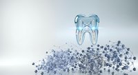 Glass tooth model with blue particles dispersing from base on white background, suitable for dental education, healthcare marketing, and medical presentations.