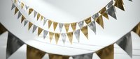 Metallic gold and silver bunting garland draped in elegant curves for festive celebrations, weddings, birthdays, and special event decorations.