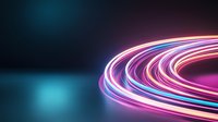 Colorful neon light trails forming curved lines against dark background, creating dynamic motion effect for technology and nightlife designs.