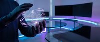 Businessman holding glowing holographic brain with digital network connections in modern office environment with futuristic lighting and technology displays.
