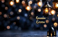 Traditional oriental lanterns glowing against dark blue background with golden bokeh lights and Ramadan Kareem greeting text, creating magical festive atmosphere.