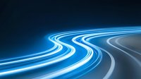 Glowing blue light trails curve through dark background creating dynamic motion effect, speed lines streaking in parallel paths against black space.