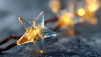 Glowing star-shaped light decoration with warm yellow illumination against dark textured background, creating magical holiday atmosphere with bokeh effect.