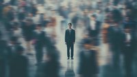 Businessman standing still amid blurred crowd, symbolizing individuality, focus, and clarity in a chaotic corporate world.