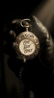 Gloved hand holding ornate silver pocket watch with One Day Only text, dark moody background for sale, promotion, or limited offer concepts.