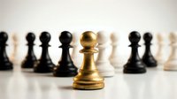 Golden chess pawn standing out among black and white pieces on board, symbolizing leadership, strategy, uniqueness and business success concepts.