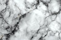 Natural marble stone texture in gray and white tones with dark veining creates luxurious surface pattern for interior design and architecture projects.