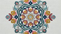 Ornate mandala with intricate geometric patterns and floral motifs in teal, pink, gold colors on neutral background for meditation and decorative design.