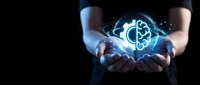 Businessman hands holding glowing atomic structure with digital particles on dark background representing science technology innovation and research concepts.