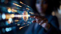 Young African American woman pointing at glowing digital data visualization display with binary code and light effects in dark office environment. Technology concept.