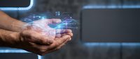 Businessman holding glowing digital data hologram in palm, representing technology transfer, innovation, and future business solutions for corporate presentations.