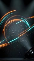 Abstract futuristic light trails with orange and cyan glowing rings creating dynamic motion effects on dark background for technology designs.