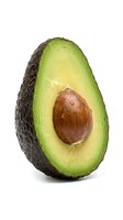 Fresh avocado half with pit isolated on white background, ready for food and culinary design projects, healthy eating and nutrition concepts.