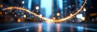 Magical glowing golden light trail with sparkles and bokeh effects against blue background, creating ethereal atmosphere for festive designs and celebrations.