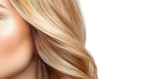 Luxurious blonde hair with golden highlights flowing in soft waves, showcasing healthy shine and natural movement for beauty and haircare concepts.