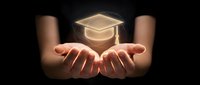 Hands holding glowing graduation cap symbolizing education achievement, academic success, learning goals, scholarship opportunities, and knowledge empowerment concept.