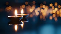 Glowing candle flame with warm bokeh lights creating peaceful ambiance for meditation, spa treatments, romantic dinners, and relaxation moments.
