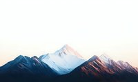 Majestic snow-capped mountain peaks at sunrise with soft pink alpenglow illuminating the ridges against clear morning sky, creating dramatic natural landscape.