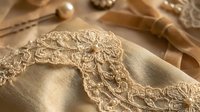 Cream-colored lace trim with intricate floral embroidery detail on folded fabric, surrounded by sewing supplies and wooden tools for textile crafting projects.