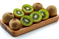 Fresh ripe kiwi fruits cut in half showing bright green flesh and black seeds arranged on wooden serving board, whole kiwis for healthy eating concept.