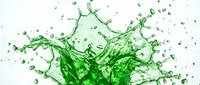 Dynamic green liquid splash with droplets and crown formation on white background for creative design projects and advertising campaigns.