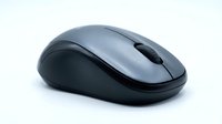Wireless computer mouse with gray and black design isolated on white background, suitable for technology and office design projects.