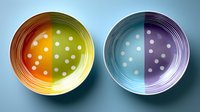 Colorful ceramic bowls with polka dot pattern and gradient design featuring orange, green, blue and purple tones on light background, modern tableware styling.