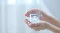 Hands holding glowing eye icon symbol, representing vision, surveillance, privacy protection, and digital technology concepts for business and innovation.