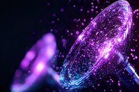 Glowing purple and blue light bulb with magical sparkles and bokeh effects on dark background, creating ethereal atmosphere for creative design projects.