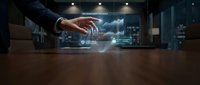 Businessman hand touching holographic digital interface with security icons in modern office environment for technology and cybersecurity concepts.