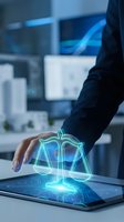 Businessman in dark suit holding tablet displaying glowing neon scales of justice hologram, symbolizing legal compliance, law, and digital technology in modern corporate environment.