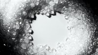 Ice cubes arranged in circular frame on white background, isolated for design use on packaging, beverages, and cooling product marketing materials.